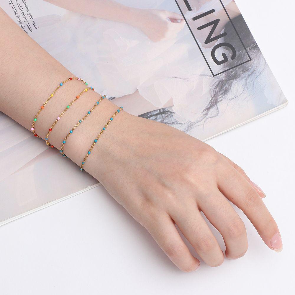 Kalung Gelang Rantai Desain Bunga Bahan Stainless Steel Warna Emas Untuk Wanita