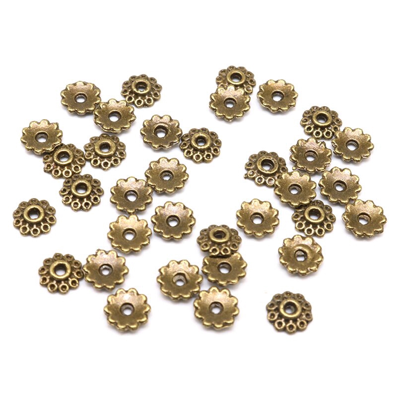 100 / 200 Pcs Manik-Manik Spacer Bahan Alloy Motif Bunga Ukuran 5mm