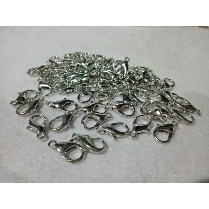 

kokot udang 14mm. SILVER lobster clabs (1 lusin)