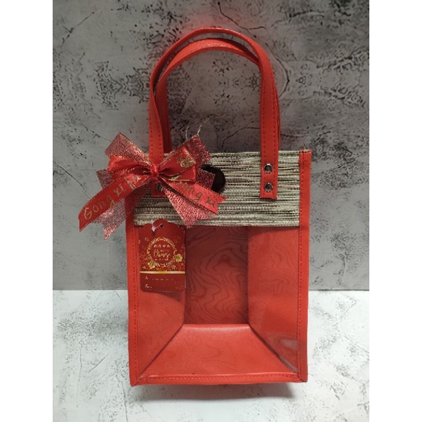 

tas semi kulit anyaman tikar Imlek hampers