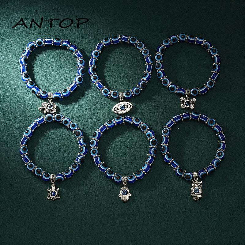 Gelang Tali Elastis Dengan Manikmanik Kaca Bulat Motif Mata Iblis Warna Biru