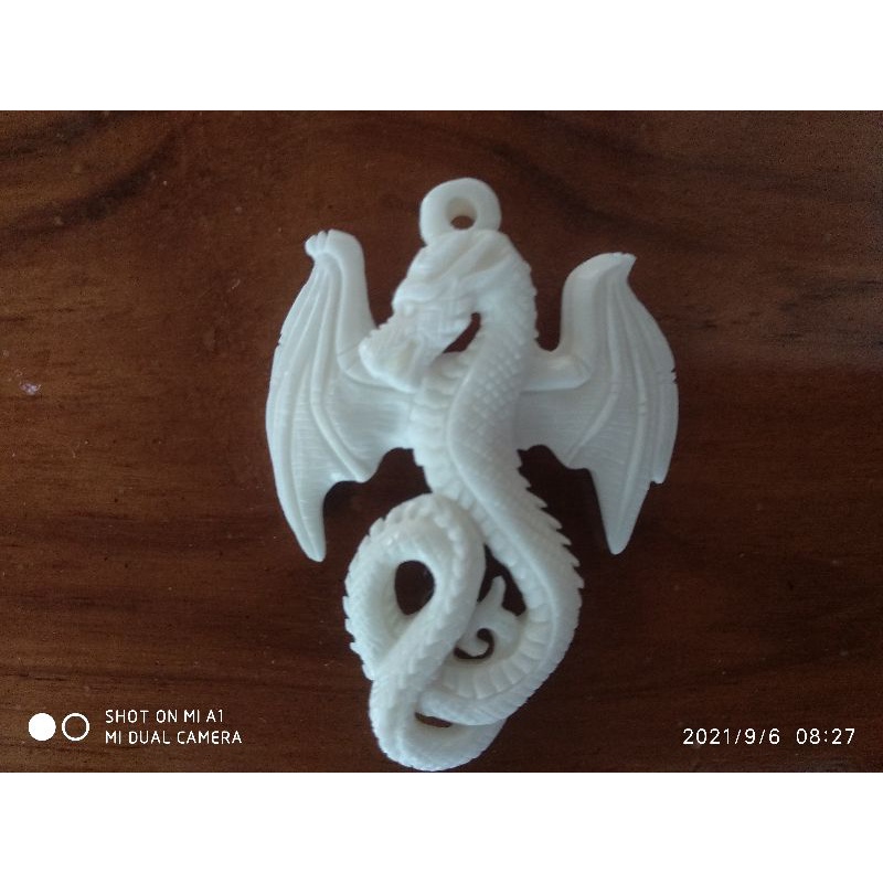 kalung ukiran naga sangat detail