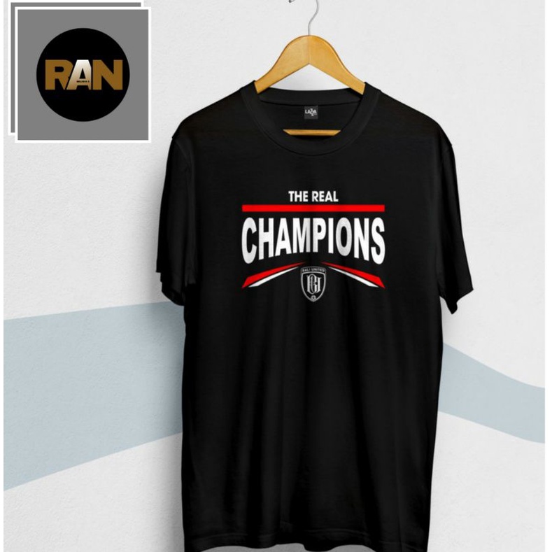 Baju T-shirt Kaos THE REAL CHAMPIONS l Kaos Edisi khusus Bali United juara Liga 1 Indonesia l Kaos S