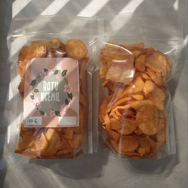 

Keripik Singkong Pedas 100g (Kemasan Pouch)