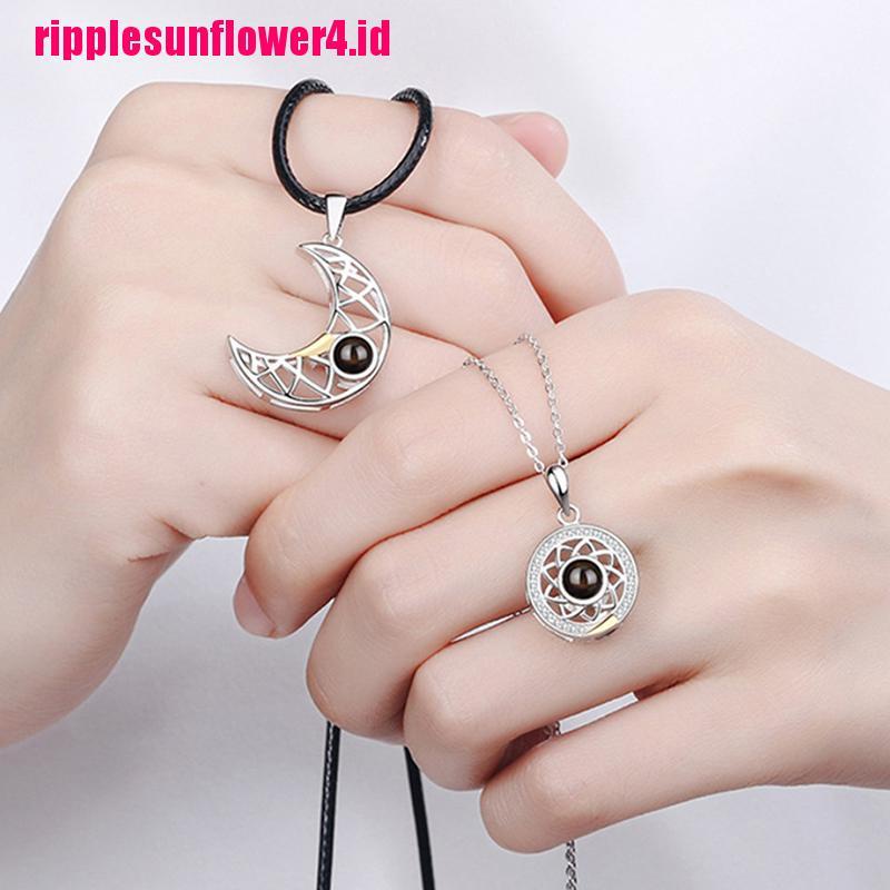 2pcs Kalung Rantai Dengan Liontin Matahari / Bulan Sabit Magnetik 100 Bahasa Untuk Wanita