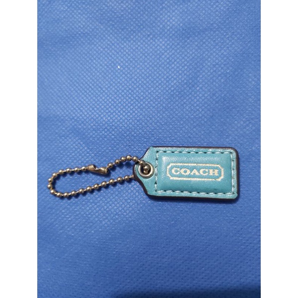 Preloved coach hangtag warna tosca