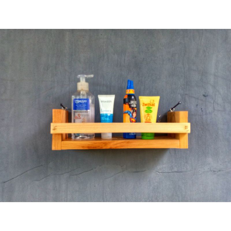 tempat rak display kosmetik dinding