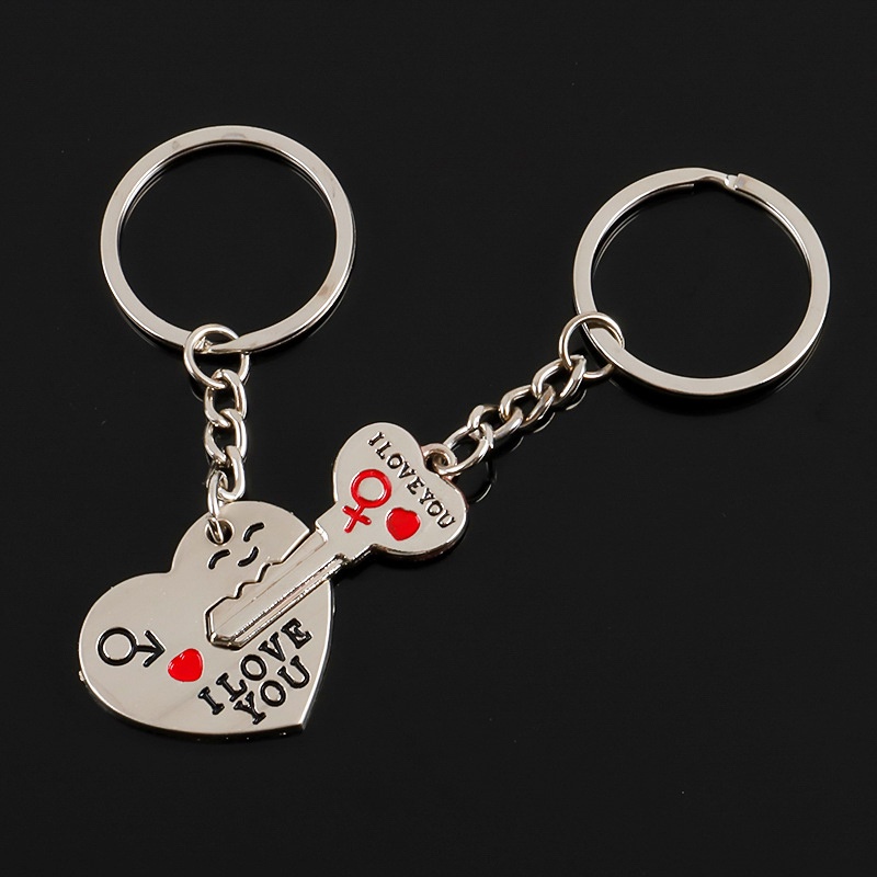 Aksesoris: Set 2Pcs Gantungan Kunci Pasangan Bentuk Hati+Kunci Tulisan 'I Love You' , Warna Silver produk baru mode
