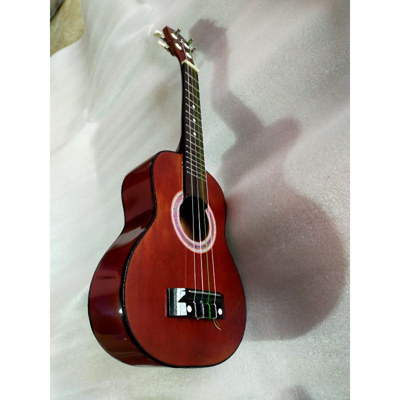 ukulele kencrung senar bagus bonus pick paking dua lapis