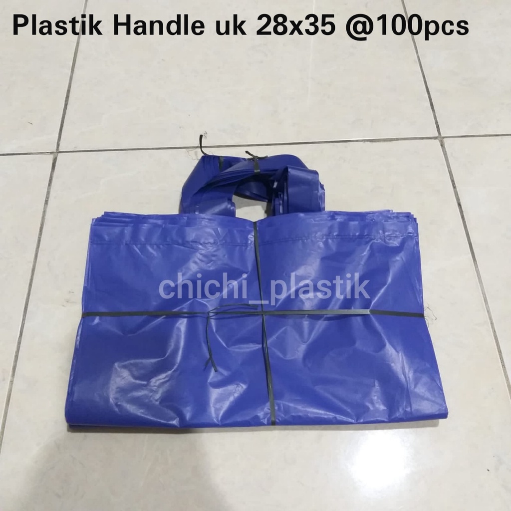 Plastik Handle uk 28x35 / Kantong plastik shoft handle / kantong souvenir polos Uk 28x35