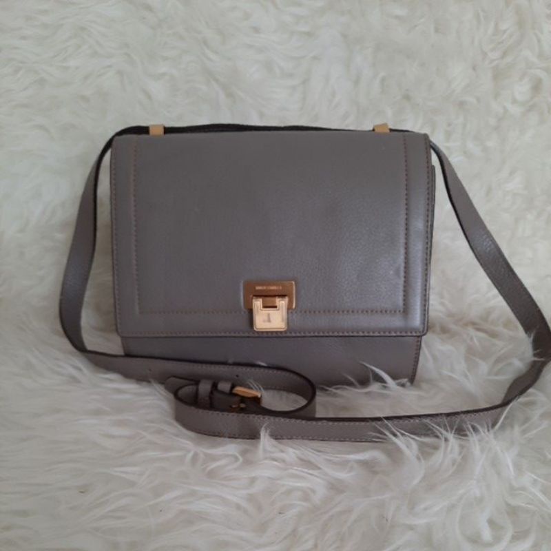 Preloved sling bag Biker Starlet