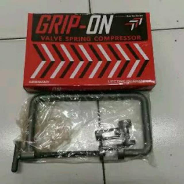 Valve spring compressor grip on