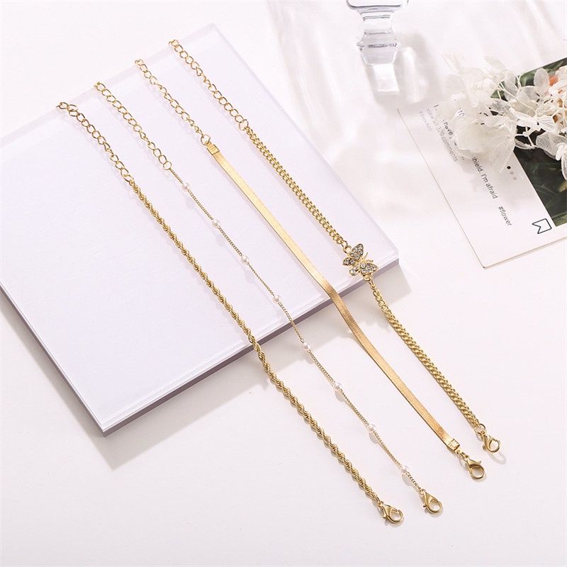 4pcs / Set Gelang Multilayer Desain Kupu-Kupu Aksen Berlian Mutiara Untuk Wanita