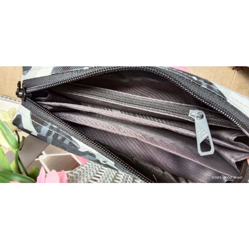 Dompet pria dan wanita banyak ruang /clutch pria dan wanita