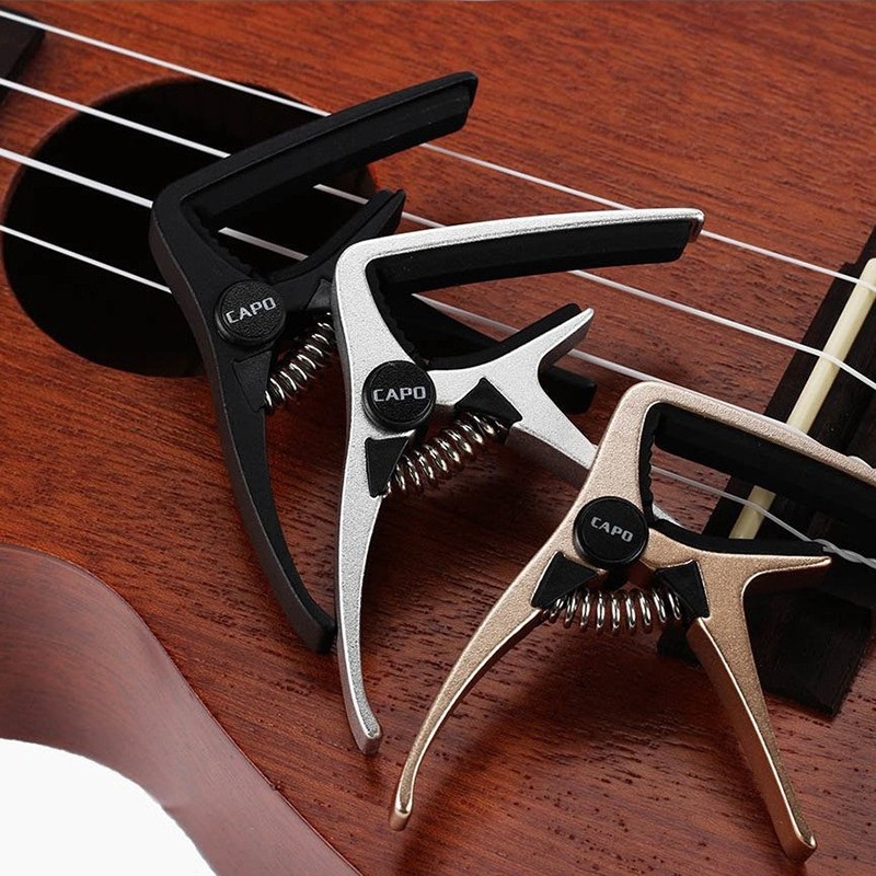 Professional Ukulele Capo 4 Strings Hawaii Guitar Capos Single-handed Quick Change Ukelele Capo