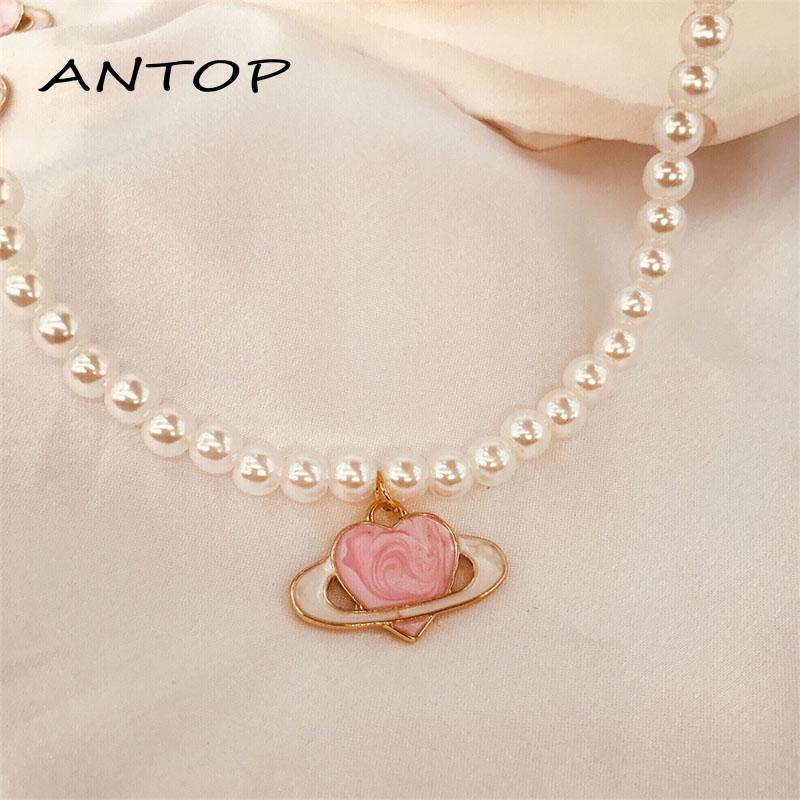 Kalung Rantai Dengan Liontin Bentuk Planet Warna Pink Untuk Wanita