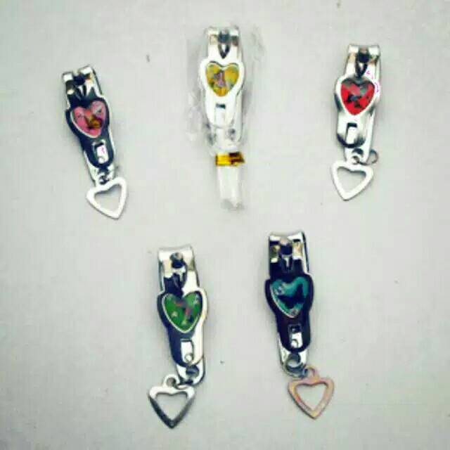 

souvenir gunting kuku love