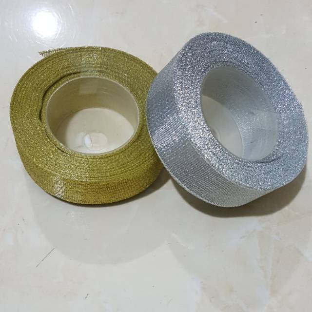 

Pita Gliter gold dan silver 3/4 / 2 cm