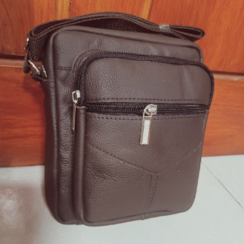 Tas kecil polos pria kulit asli mirah