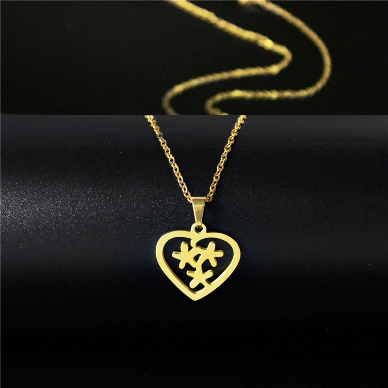 Ornamen wanita 18K Emas stainless steel Kalung glossy memotong jantung catatan klavikula rantai lion