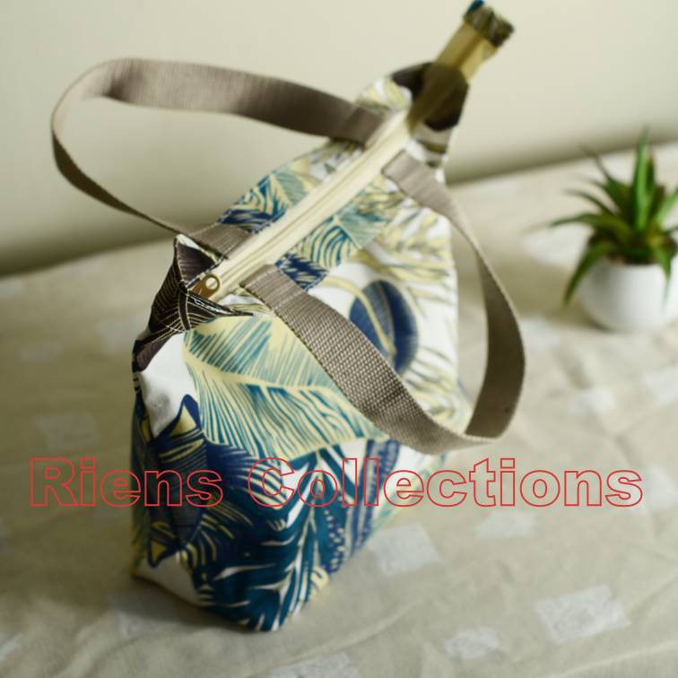 RIENS COLLECTIONS. HANDBAG BESAR BAHAN KANVAS MOTIF TROPIKAL