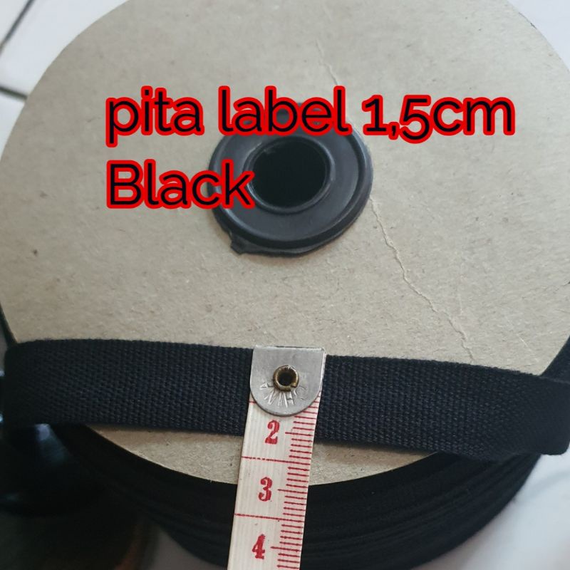 

Pita label/Canvas katun Hitam lebar 1,5cm dijual per Rool isi 200 mtr