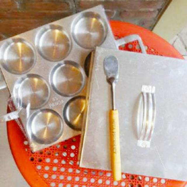 Cetakan Kue Lumpur Lubang 9