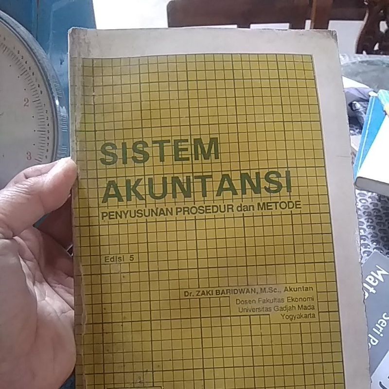 sistem akuntansi Zaki baridwan