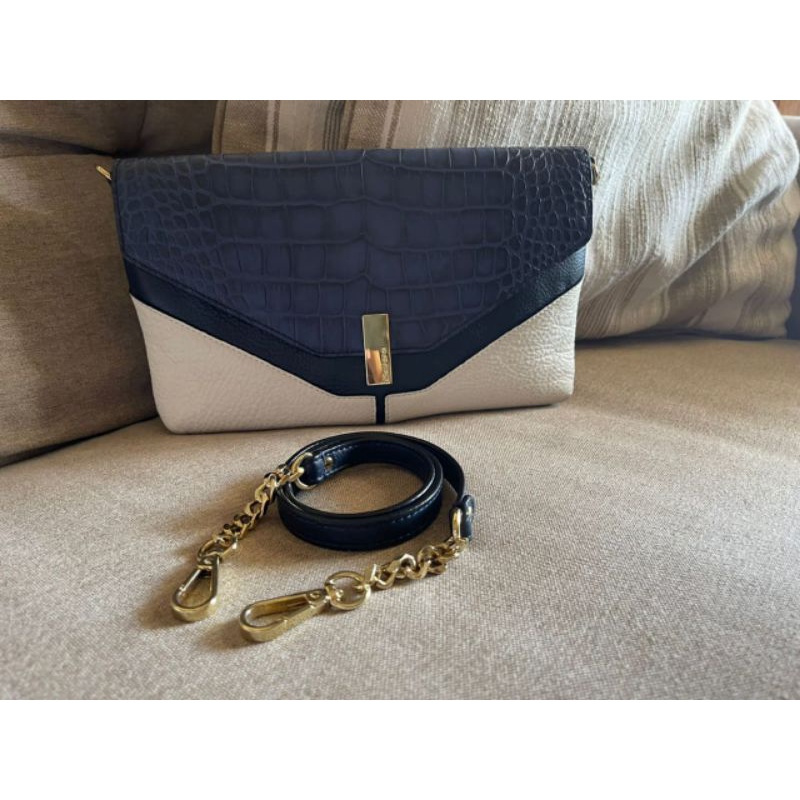 Donini Navy clutch croco