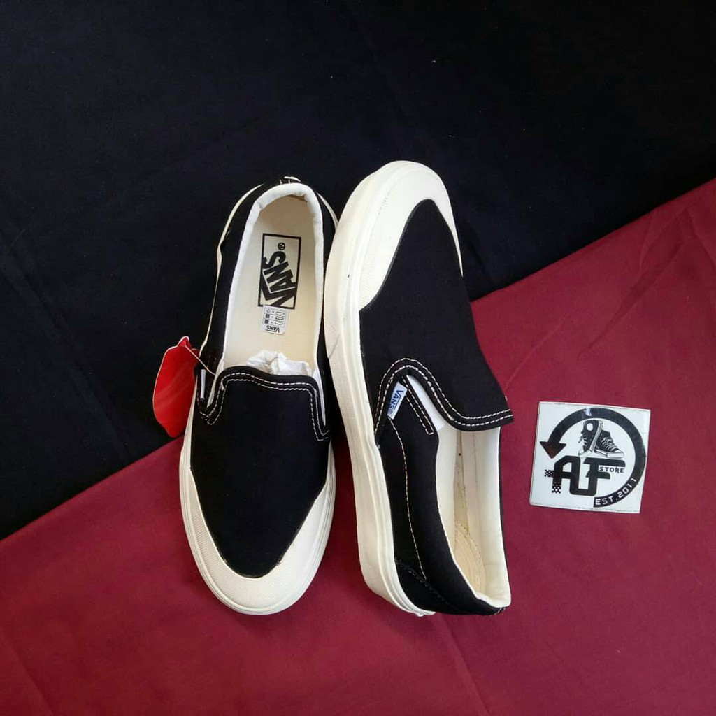 vans slip on half moon