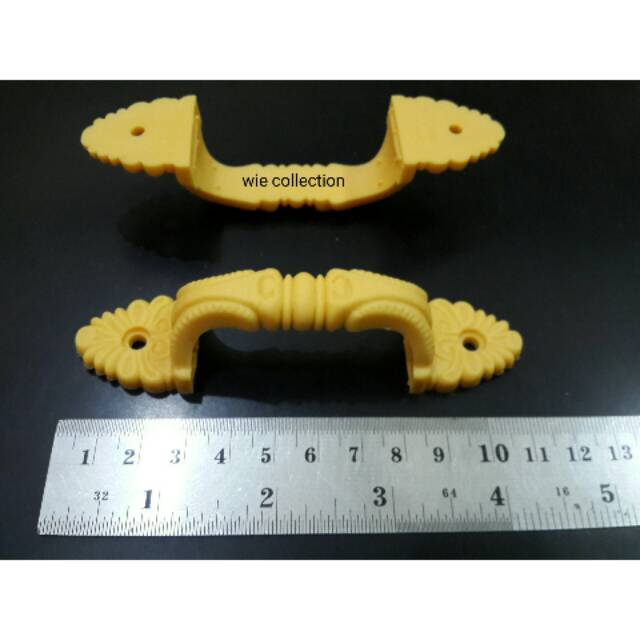 Handle Rak Dan Lemari Toso Plastik Warna Kuning..1bks Isi 12pcs