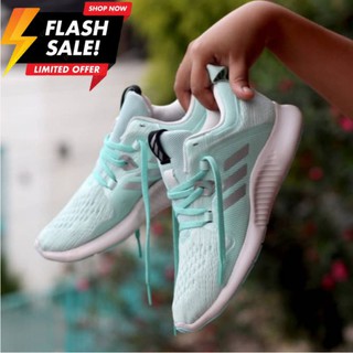 mint green running trainers