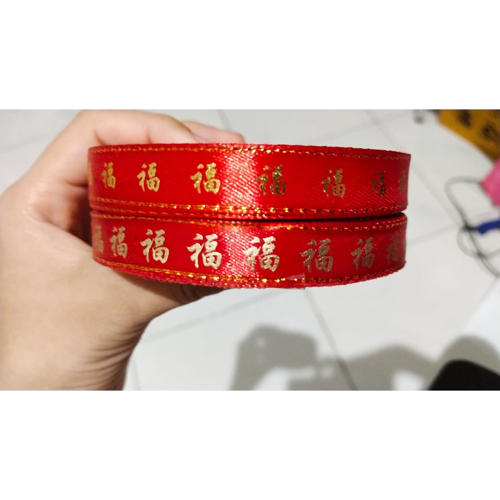 

(25 yard) Pita Imlek 1,3 cm | Pita Gong Xi Fa Cai | Pita Chinese New Year | Pita Fu | Toko Bahan Craft | Grosir Pita