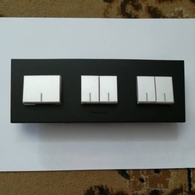 Panasonic Black Silver Saklar 5 Gang Iluminasi