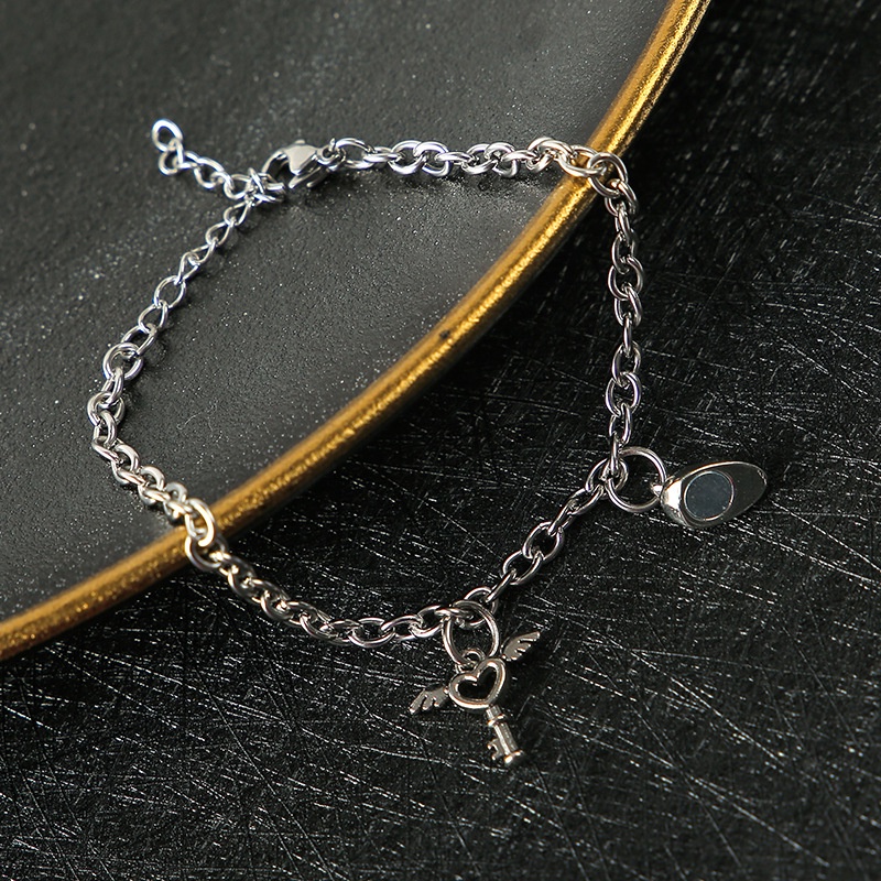 Bentuk hati kunci hisap beberapa gelang gaya Korea sederhana magnet berbentuk hati kunci pria dan wa