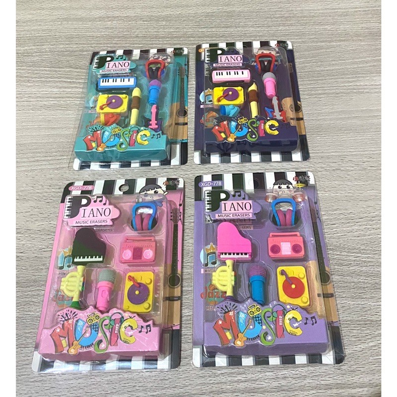 

Penghapus alat musik piano gitar saxophone radio mic headphone seruling