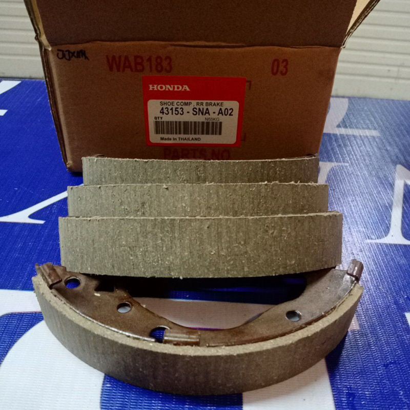 kampas rem belakang mobilio