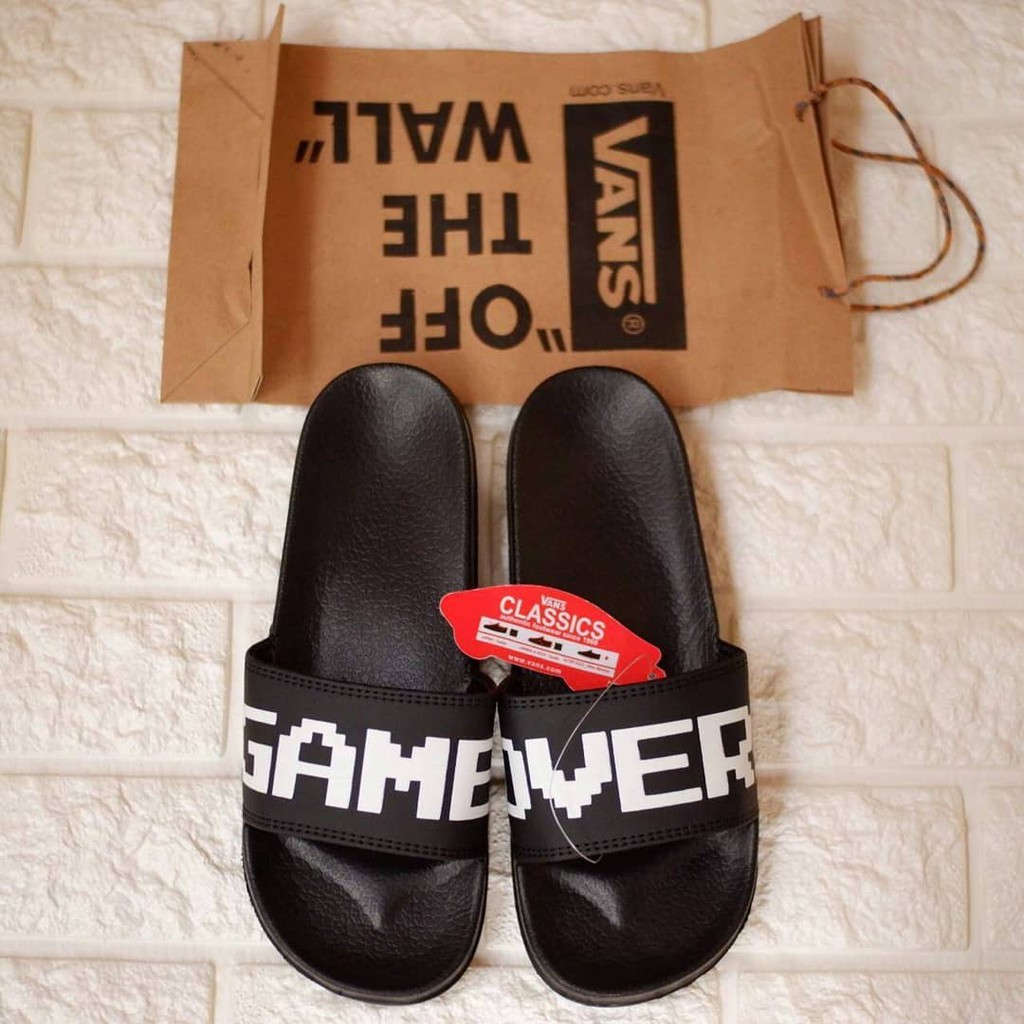 vans game over flip flops
