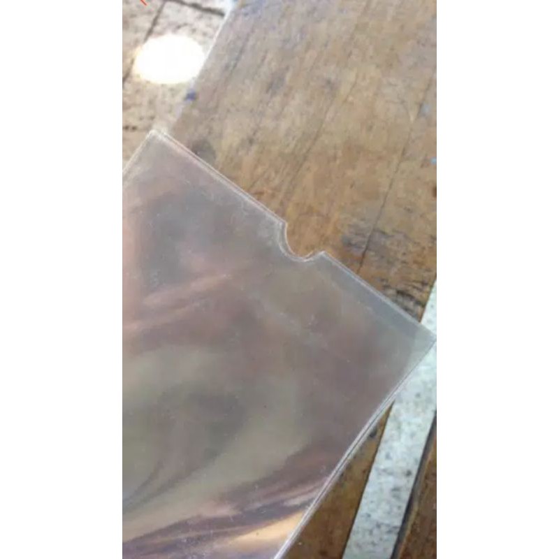 plastik kemasan kaos kaki bening isi 100 lembar ukuran 11×28