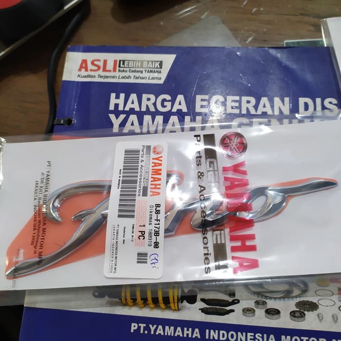 EMBLEM COVER BODY FINO-125/ FINO GRANDE ORIGINAL YAMAHA ORIGINAL