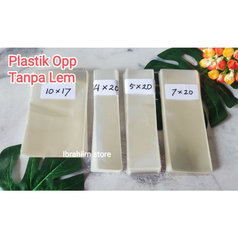 (100gr) PLASTIK OPP TEBAL TANPA LEM PANJANG 10 CM PLASTIK KONEKTOR MASKER / PLASTIK ACCESORIES PLASTIK SOUVENIR