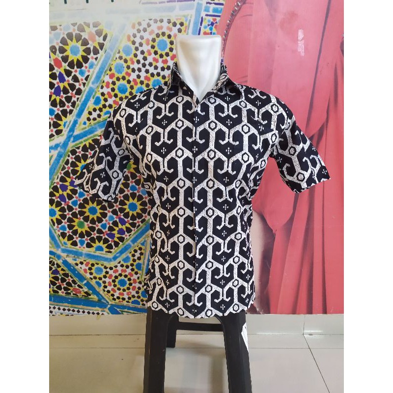 hem batik motif tenun toraja