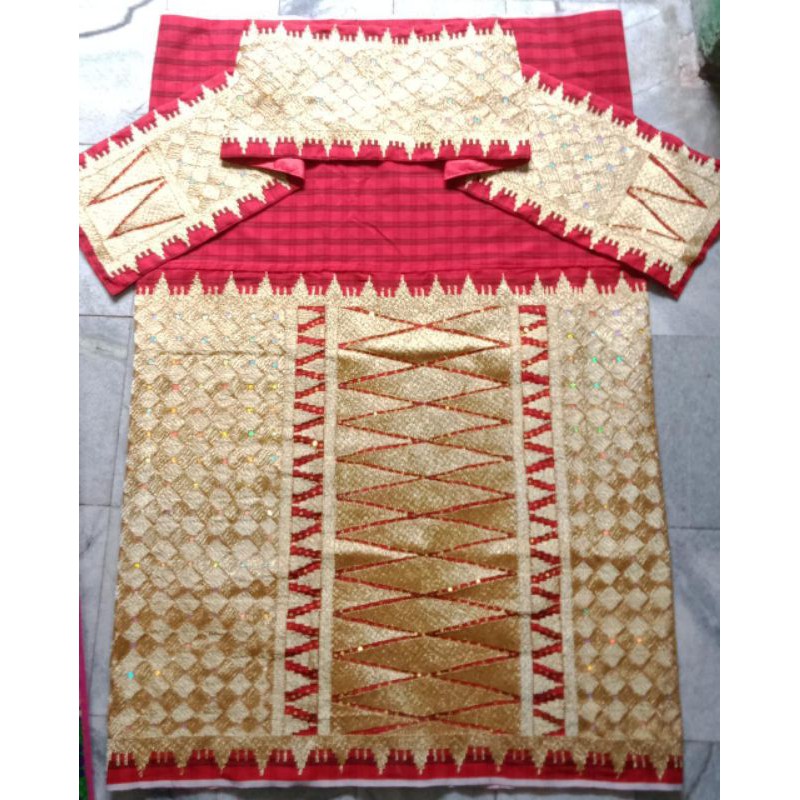 Tapis tumpal mata kibau