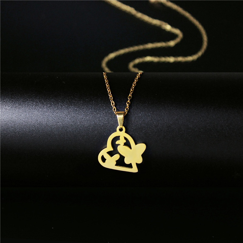 Ornamen wanita 18K Emas stainless steel Kalung glossy memotong jantung catatan klavikula rantai lion