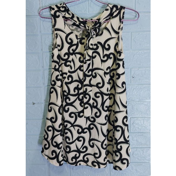 Atasan wanita tanpa lengan