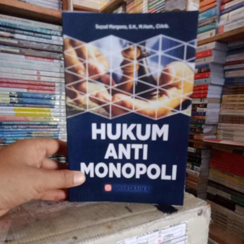 Hukum anti monopoli Suyud Margono sh