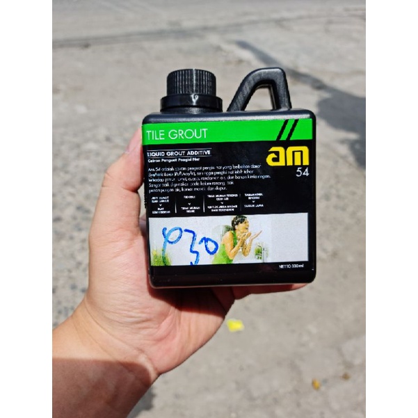 Cairan penguat pengisi nat AM 54