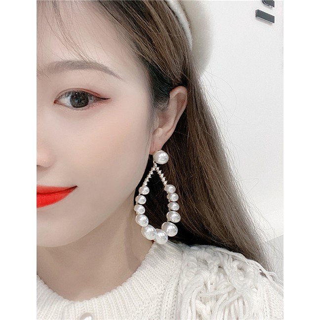 LRC Anting Fashion White Drop-shaped Pearl Earrings D64427