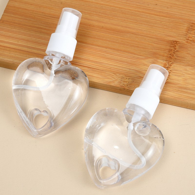 50ml Portable Fine Mist Plastic Empty Water Cosmetic Clear Heart Shape Spray Bottle With Hook