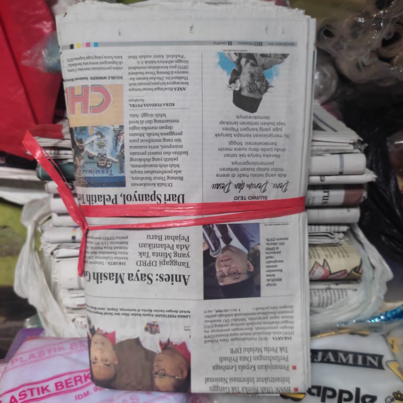 

koran bekas || bungkus nasi